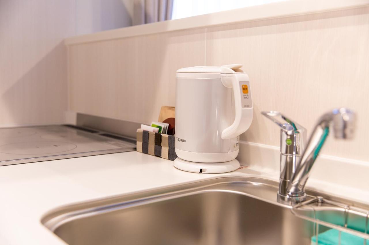 Grand Base Hiroshima Ekimae Aparthotel Kültér fotó